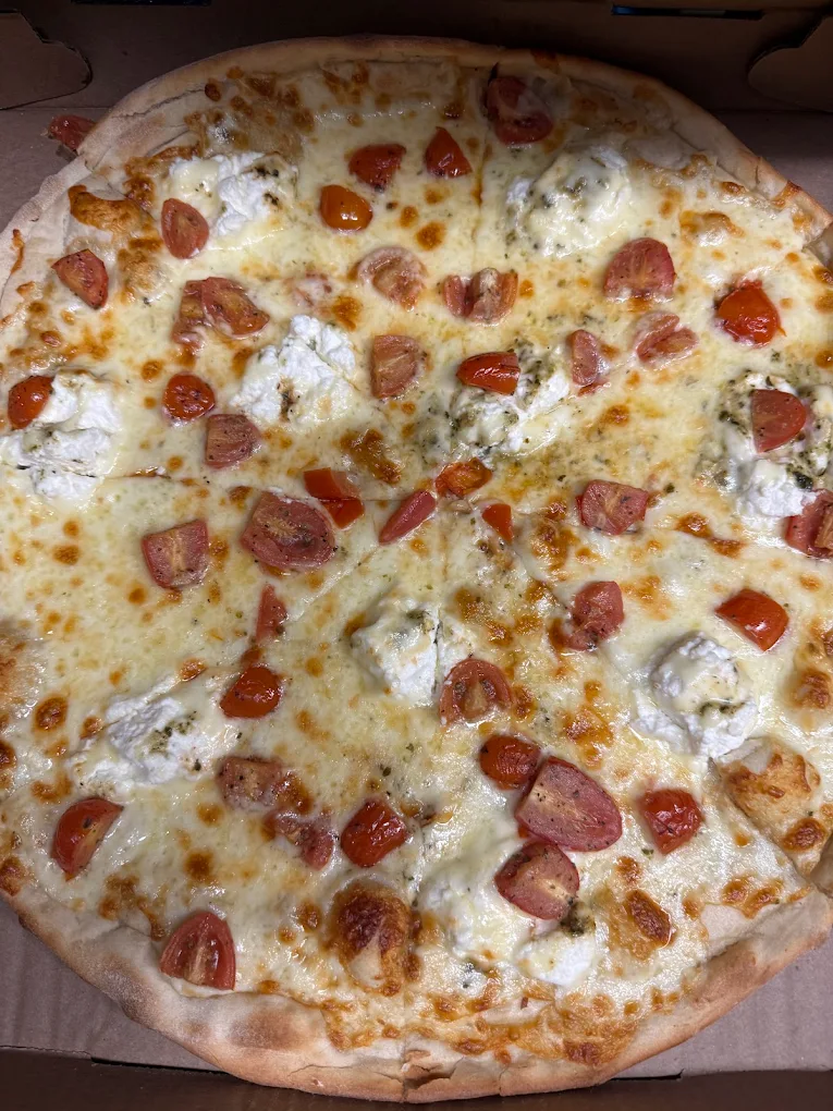 Pizza pie at Blessed Pizza & Wings